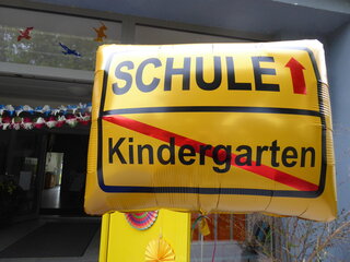 Ein Ballon symbolisiert den Abschluss der Kindergartenzeit und den Übergang zur Schule. Foto: Kindertagesstätte „Spielhaus Groß und Klein“ 